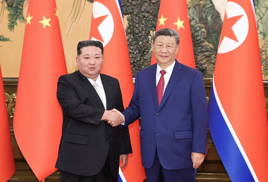 習近平総書記が朝鮮の金正恩総書記と会談