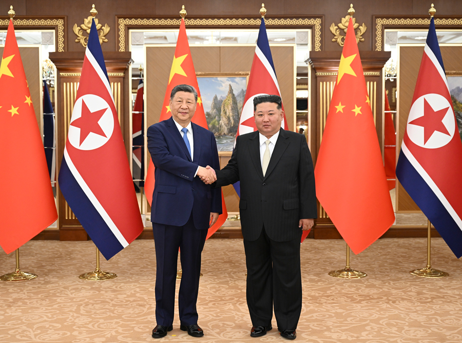 訪朝中の習近平総書記が金正恩朝鮮労働党総書記と会談